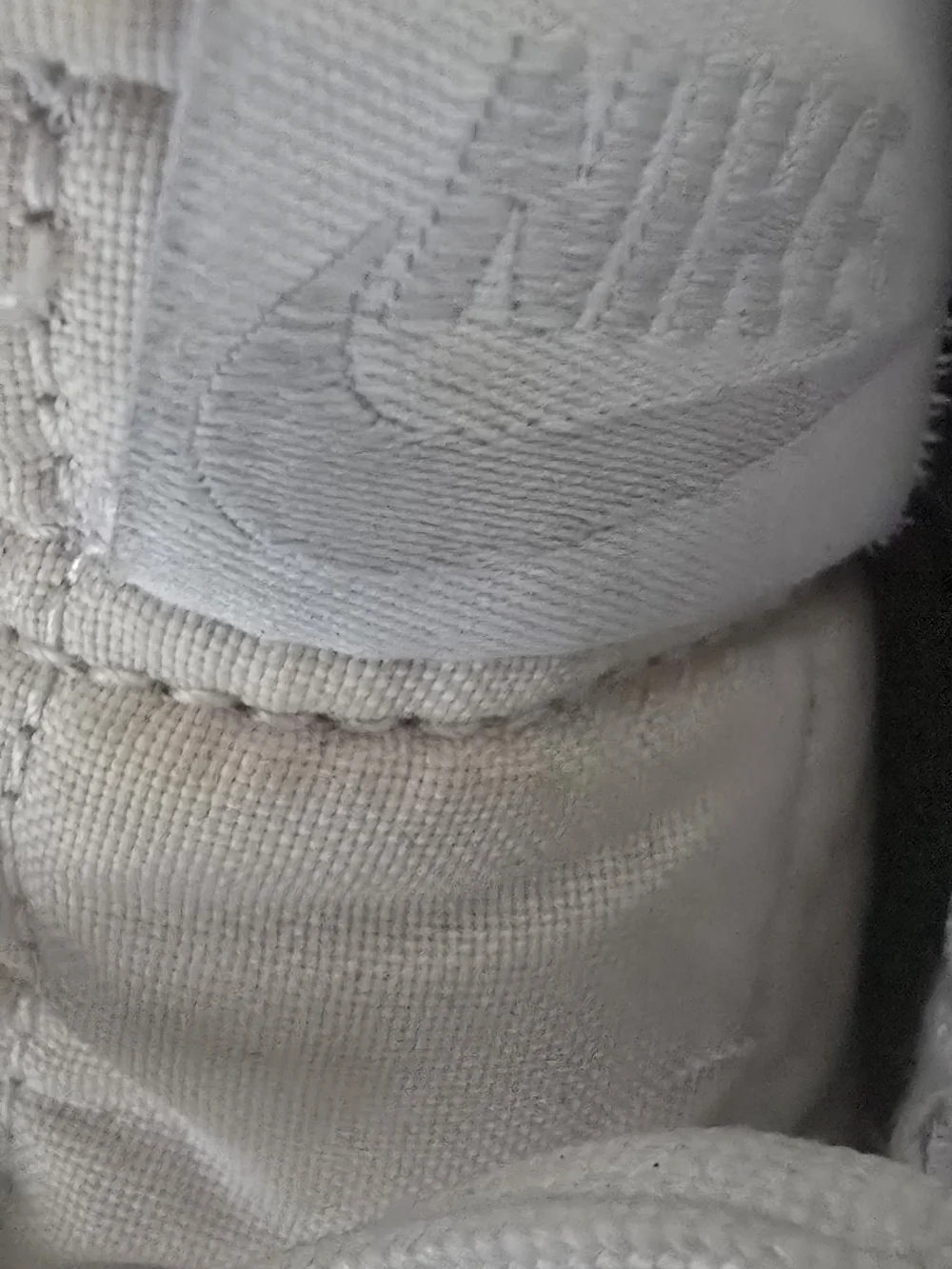 Nike White High-Top Sneakers with Blue Swoosh